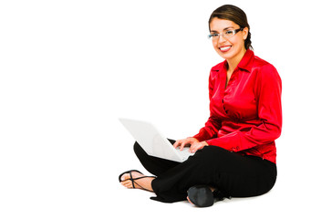 Confident woman using a laptop