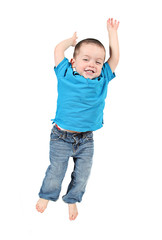 Cute little boy posing for camera on white background