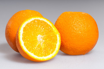 three ripe oranges
