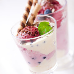 Blueberry sorbet and raspberry ice cream in a glass