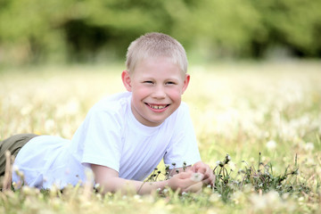 little boy playing in the park