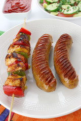 Fried sausage and skewers