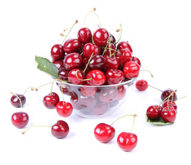 Naklejka na ściany i meble Bowl of Cherry fruits on a white background