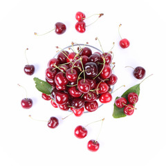 Naklejka na ściany i meble Bowl of Cherry fruits on a white background