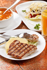 grilled steak with potatoes