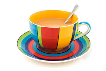 Stripy cup and saucer isolated on white