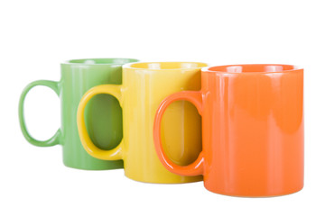 Three multi-colored cups.
