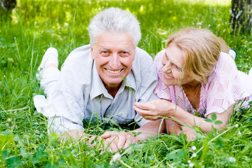 old couple on grass