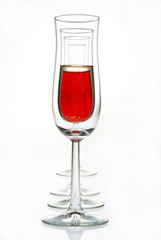 glasses with red champagne and empty glasses