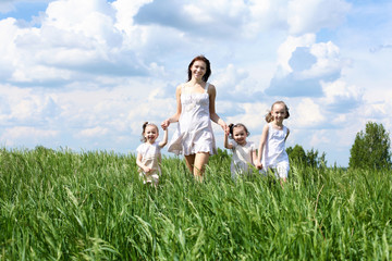 family with children in summer day outdoors