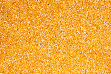 Uncoocked hominy grits  as texture