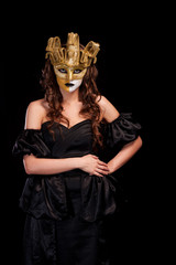 sexy woman in golden party mask