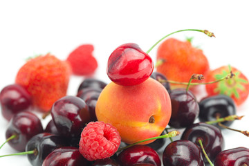 Naklejka na ściany i meble apricot, cherries, strawberries and raspberries isolated on whit