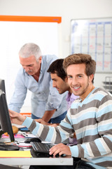 Smiling man in computing training