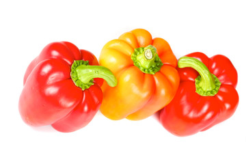 Orange and red pepper isolated on white