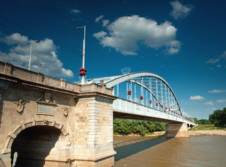 Fototapeta na wymiar Nice bridge with blue sky and clouds