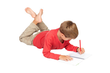 Adorable child with blond hair lying