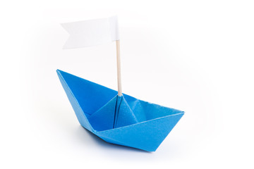 papper blue origami boat with flag