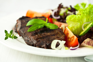 Grilled beef with vegetable salad