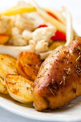 Roasted chicken breast with roasted potatoes