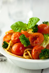 Rustic spaghetti with cherry tomatoes and broccoli