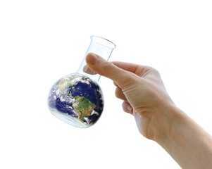 Hand holding the Earth in a flask