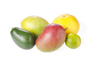Mix of tropical fruits isolated on white