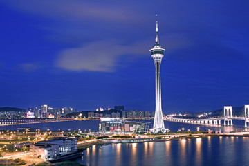 Urban landscape of Macau with famous traveling tower under sky n