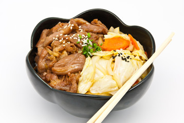 rice under fried pork and vegetable