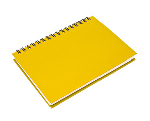 stack of ring binder book or yellow notebook