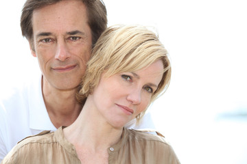 Head and shoulders of mature couple