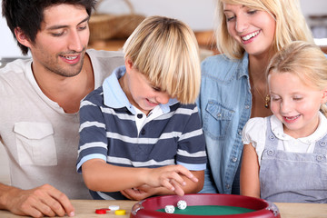 portrait of a family playing games