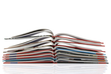 pile of new book with bending pages