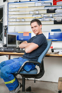 Mechanic At Auto Repair Shop