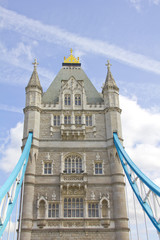 Fototapeta na wymiar Girders and tower on Tower Bridge, London, England
