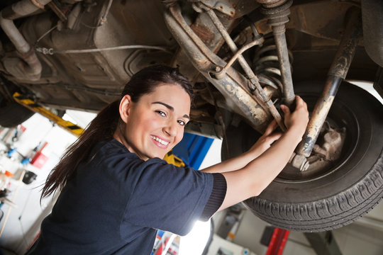 Portrait of smiling young female mechanic