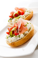 Breadroll with cream cheese and smoked bacon