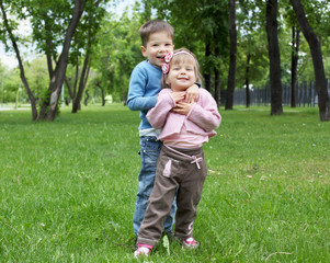 Fototapeta premium happy sister and brother outdoors