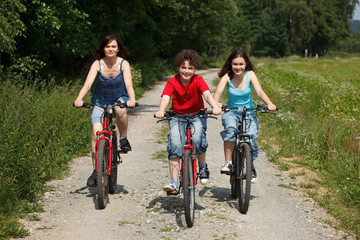 Naklejka premium Family riding bikes