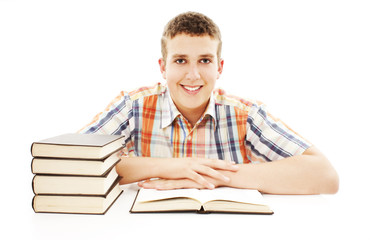 The young student with the books isolated on a white