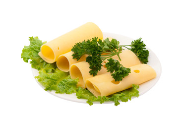 cheese with greens in a bowl