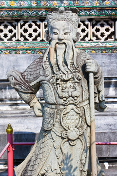 Ancient lord stone statue in Thailand Buddha temple