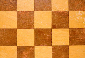 close up of old  wooden checkers board table.