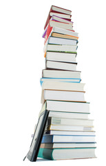 Tall stack of books and e-book reader on the white background