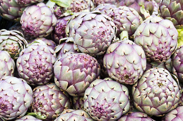 Fototapeta premium Red artichokes on display