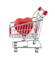 Shopping cart and red heart. Clipping path included.