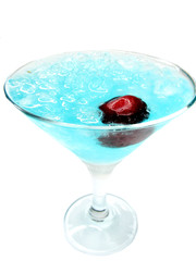 alcoholic blue lagoon cocktail with cherry