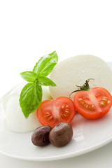 Tomato Mozzarella appetizer on white isolated background