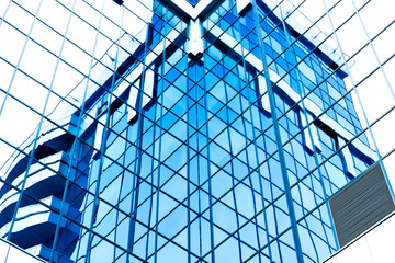 Fototapeta na wymiar glass surface of contemporary angle of business building