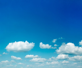 sparse clouds in the blue sky